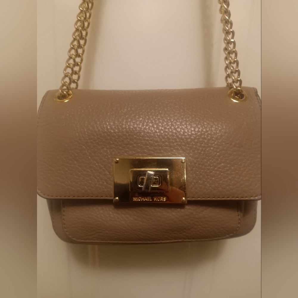 Michael Kors Sloan Small Shoulder Flap bag in a taupe or beige pebble leather .